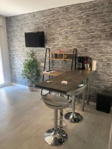 Appartements Studio meuble : photos des chambres