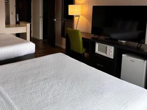 Quadruple Room with Balcony room in Rocky Mountain Hotel & Conference Center