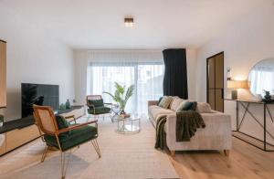 Poseidon Luxe gelijkvloers appartement met tuin ,terras en gratis parking