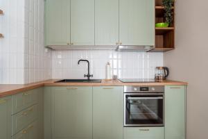 Apartament Oliwny 34 - balkon z widokiem na góry