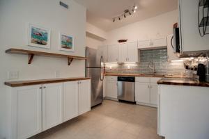 Newly Renovated Duplex, Upper Unit, 4th row from the beach