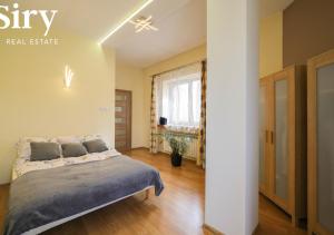 Penthouse in the Center - by Hosty