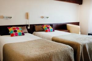 Hotels Plage des Pins : photos des chambres