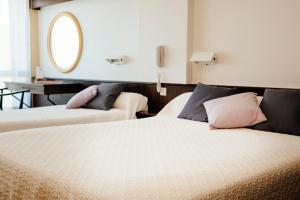 Hotels Plage des Pins : photos des chambres