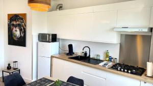 Appartements La Reconquete des remparts : photos des chambres