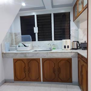 TST Transient Homes - WiFi Access, Bedroom with AC, Kitchenette, Private Bathroom