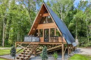 Modern A-Frame Cabin by Rip Van Winkle with Hot Tub - Cypremort