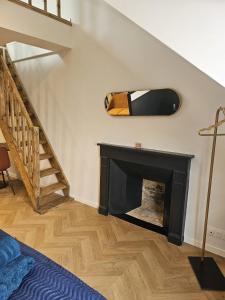 Appartements GITE Le Parisien Appartement prive en Duplex avec acces jacuzzi a 10min des plages : photos des chambres