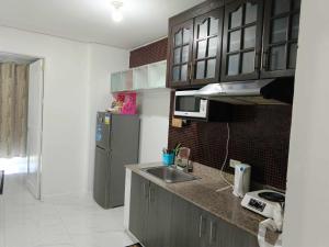 One Bedroom Condo with Balcony & Pool - Carosa Staycation