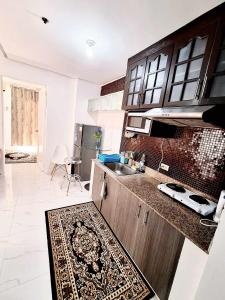 One Bedroom Condo with Balcony & Pool - Carosa Staycation