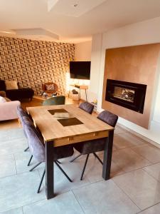 Sejours chez l'habitant Chambre bleu canard : photos des chambres
