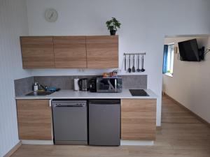 Maisons de vacances L'escapade secrete Jacuzzi et Sauna privatif : photos des chambres
