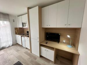 Appartements Charmant studio avec terrasse : photos des chambres