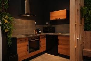 Appartements Cine jungle duplex balneo : photos des chambres