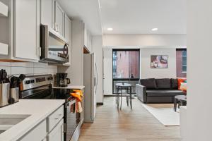 CozySuites on Mass with garage parking #13