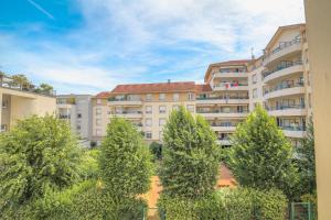 Chaleureux et Cosy avec parking privé