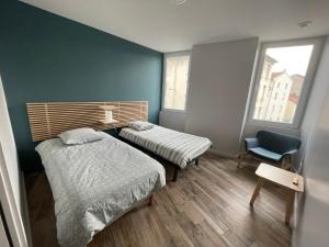 Appartements Appart du faubourg : photos des chambres