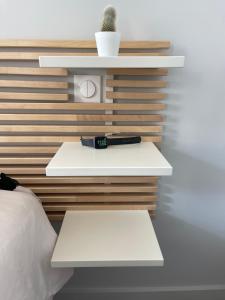 Appartements Appart du faubourg : photos des chambres