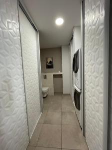 Appartements Appart du faubourg : photos des chambres