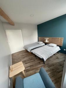 Appartements Appart du faubourg : photos des chambres