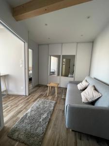 Appartements Appart du faubourg : photos des chambres