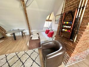 Appartements Loft Romantique - Balneo - Billard - Massage : photos des chambres