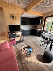 Chalets Cottage du Mauberme avec bain nordique : photos des chambres