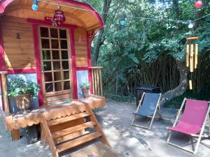 Tentes de luxe La roulotte du petit paradis : photos des chambres