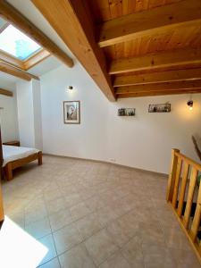 Appartements Maison de village : photos des chambres