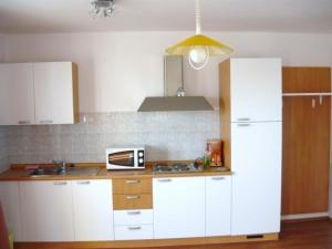 Klimatisierte Wohnung mit Whirlpool und Grill 
