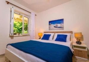 Wohnung in Pjescana Uvala mit Terrasse und Garten 