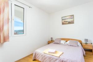 Apartments by the sea Mastrinka, Ciovo - 23399