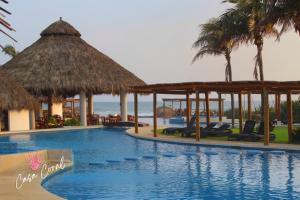 Depa Coral con Club de Playa Exclusivo Playa Bonfil Diamante