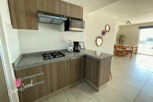 Depa Coral con Club de Playa Exclusivo Playa Bonfil Diamante