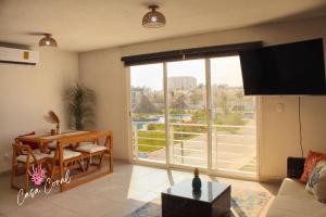 Depa Coral con Club de Playa Exclusivo Playa Bonfil Diamante