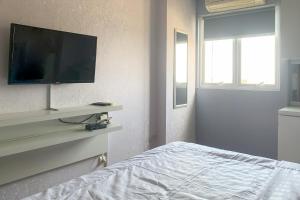 RedLiving Apartemen The Suites Metro - KS 2 Property Tower E