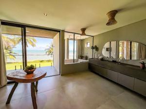 Casa Waua | PÉ NA AREIA, rooftop, borda infinita