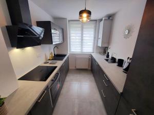 Appartement 3 ch avec garage, proche Technhom