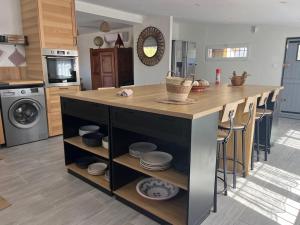 Villas Maison de charme, piscine et vue panoramique : photos des chambres