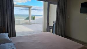 Departamento Las Olas con terraza frente al mar