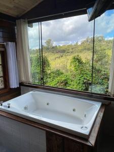 Encanto da Mata - Chalé Ipê - Lavras Novas-MG