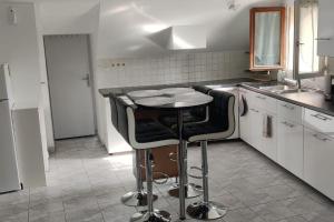 Appartements Location appartement pour les JO : photos des chambres