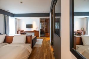 Phòng Deluxe 4 Người (Deluxe Quadruple Room)