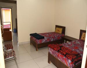 Rajlaxmi Palace by StayApart