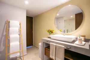 Upscale Corner Unit with Large Wrap Around Balcony and Pools