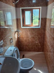 Aris cozy rooms, Llogara