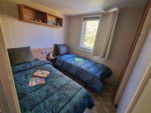 Campings Mobil-Home 419 Camping Lac des reves proche de la mer : photos des chambres