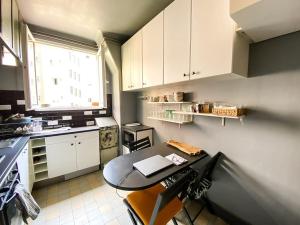 Appartements Le Charming - Paris parc de la Villette - Canal de l-Ourq : photos des chambres