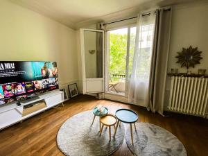 Appartements Le Charming - Paris parc de la Villette - Canal de l-Ourq : photos des chambres
