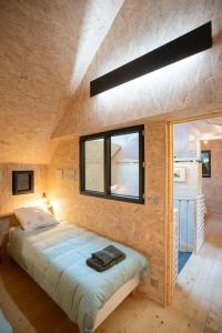 B&B / Chambres d'hotes La Ferme du golf, gite atypique et artistique : photos des chambres